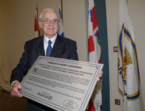 Photo: André Laperrière presented with Plaque from Ville de Outremont in October 2011