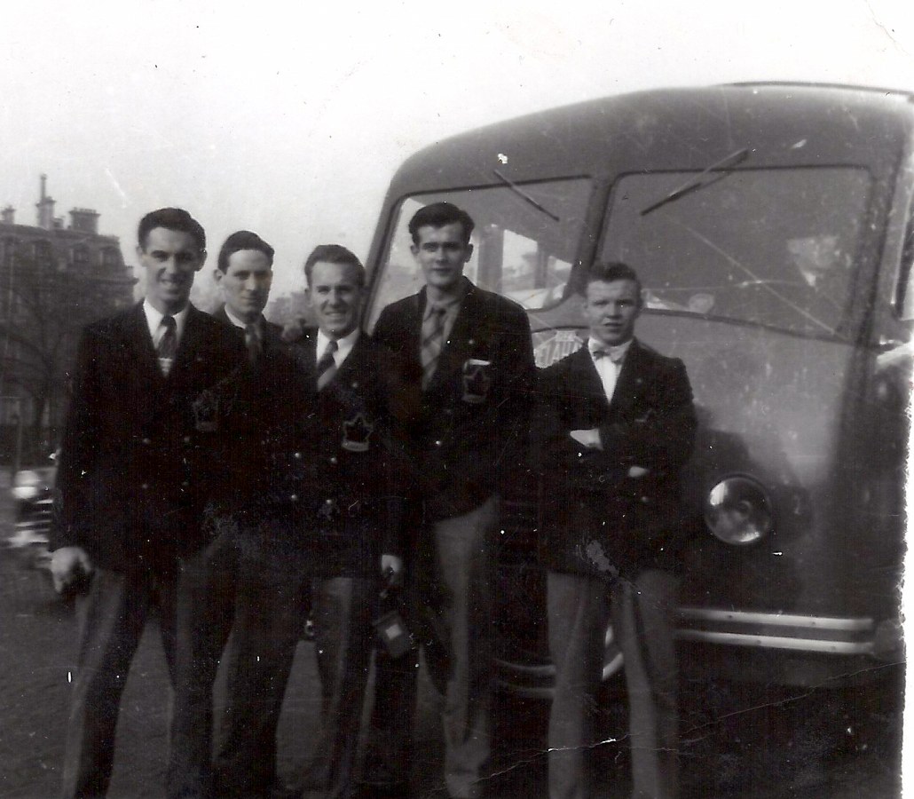 Photo: Some Flyers in Front of a Bus in Czechoslovakia