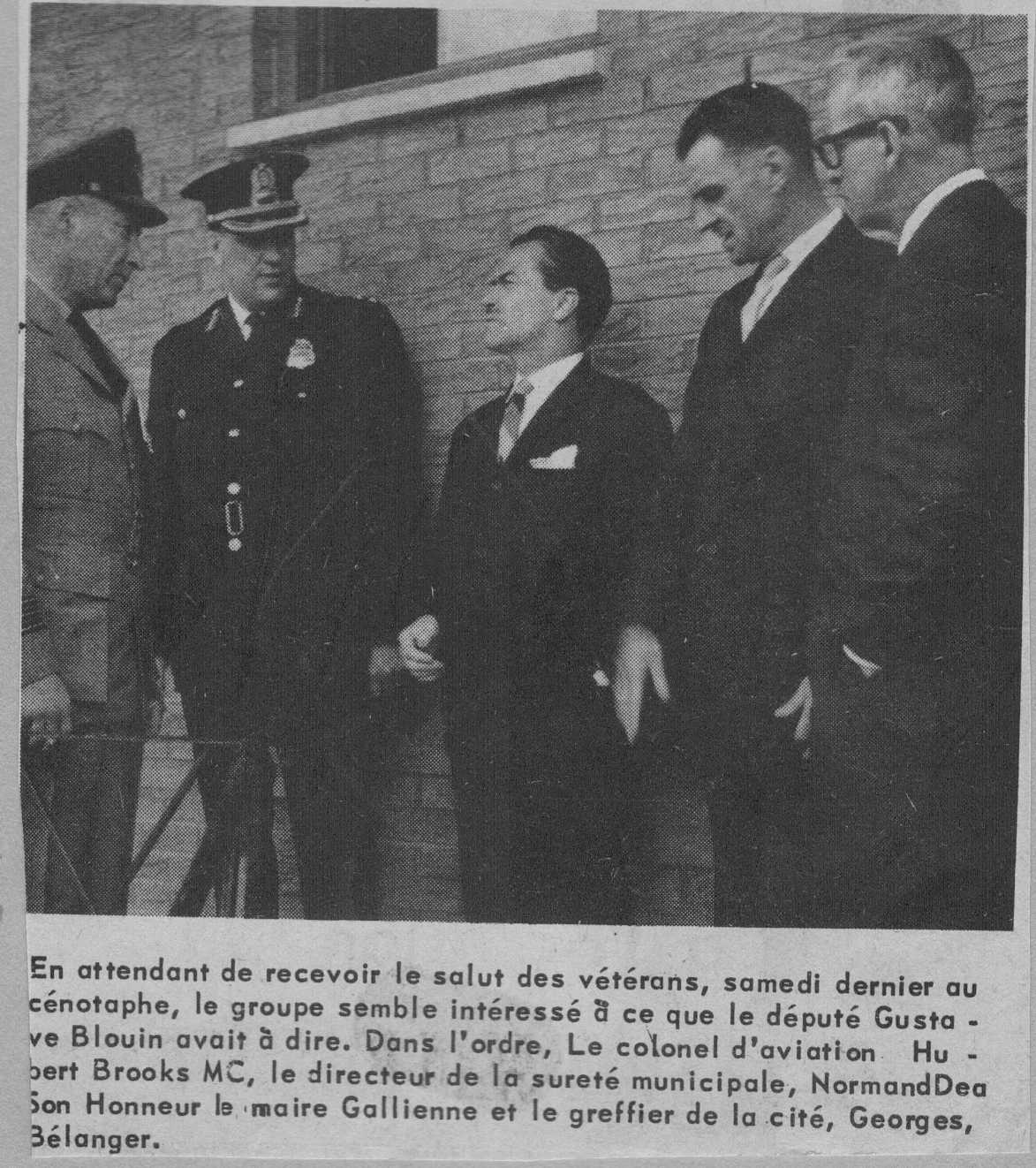 Photo: W/C Hubert Brooks talks to officials at Remembrance Day Ceremony 