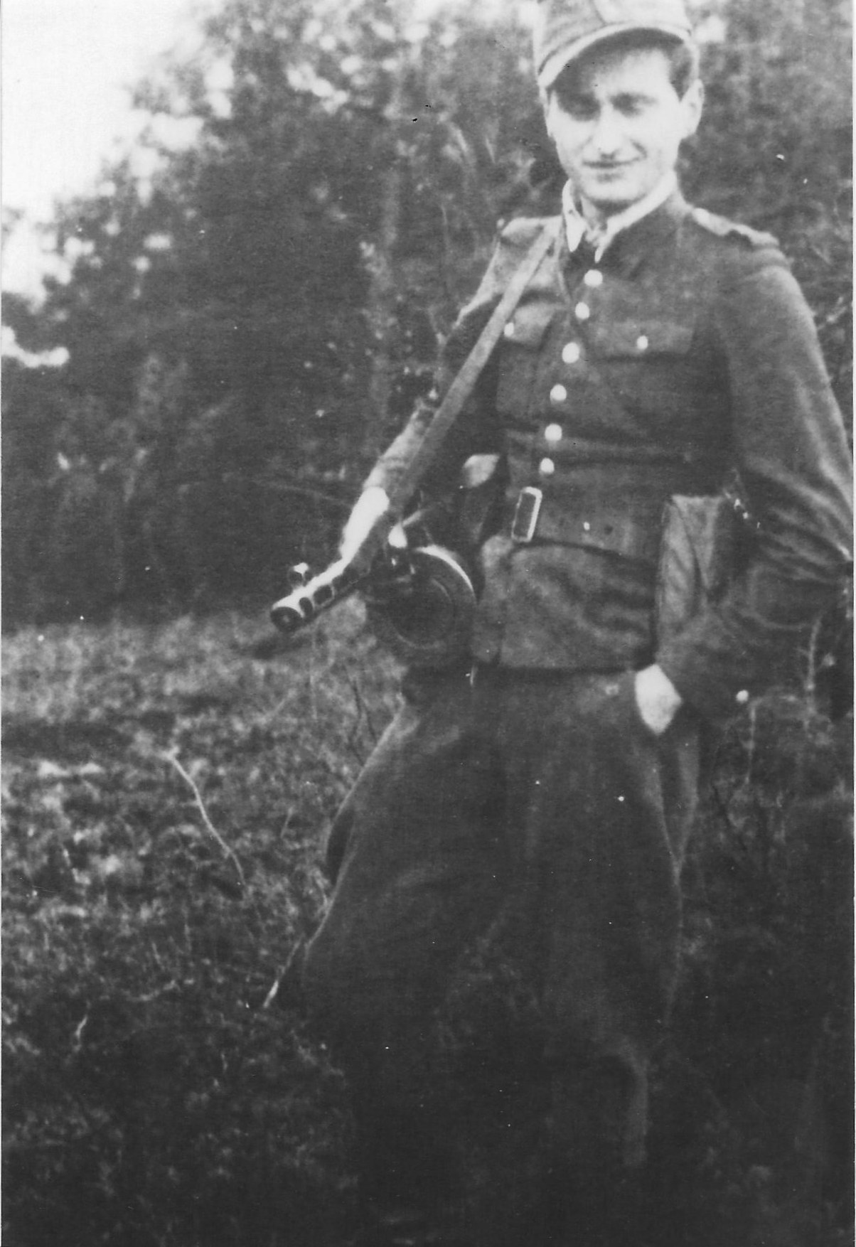 Photo:  Józef Węglarz  ps Mały  With Machine Gun in 1944 