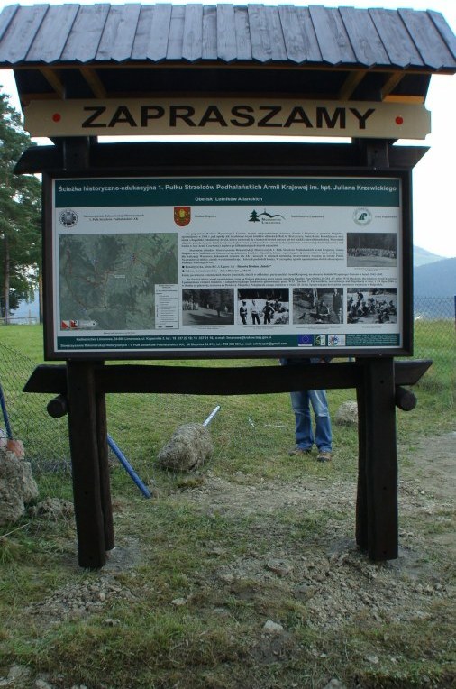 Image of Zapraszamy Information Board Referencing Hubert Brooks on Tymbark Poland  remembrance trail commemorating  the Polish Home Army during WW 2