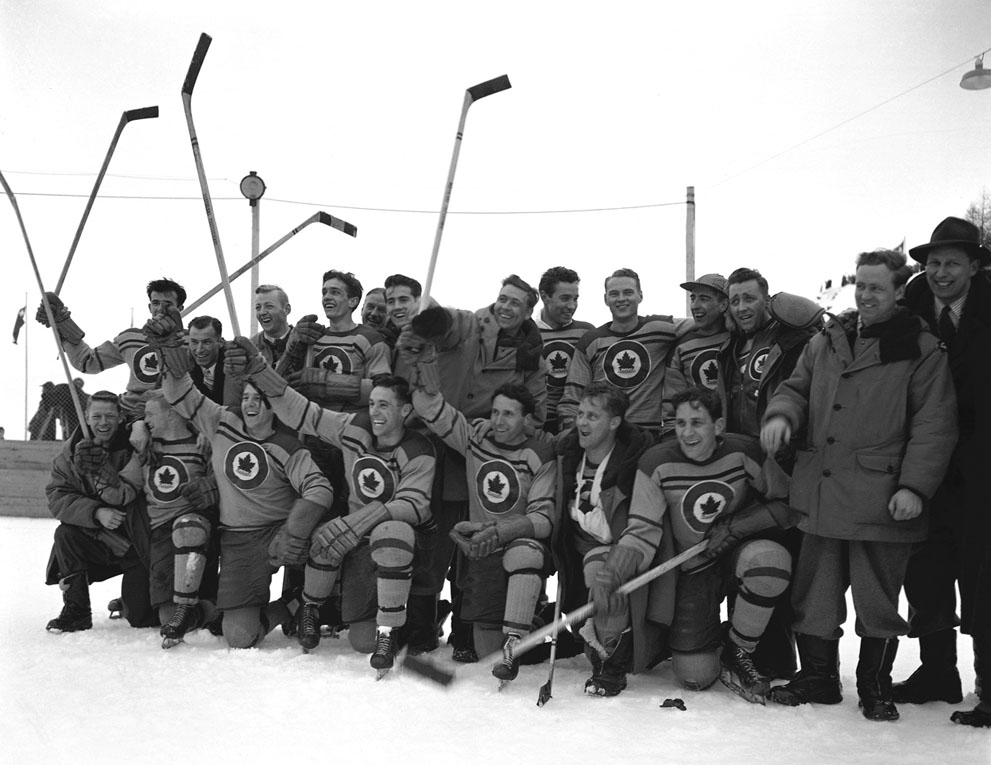 Photo: R.C.A.F. Flyers Hockey Team Celebrate Announcement of Olympic Hockey Gold Medal Win 