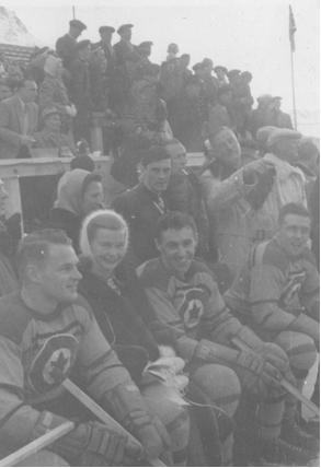 Photo:Barbara Ann Scott Sitting At RCAF Flyers Bench Near End of game with Austria 